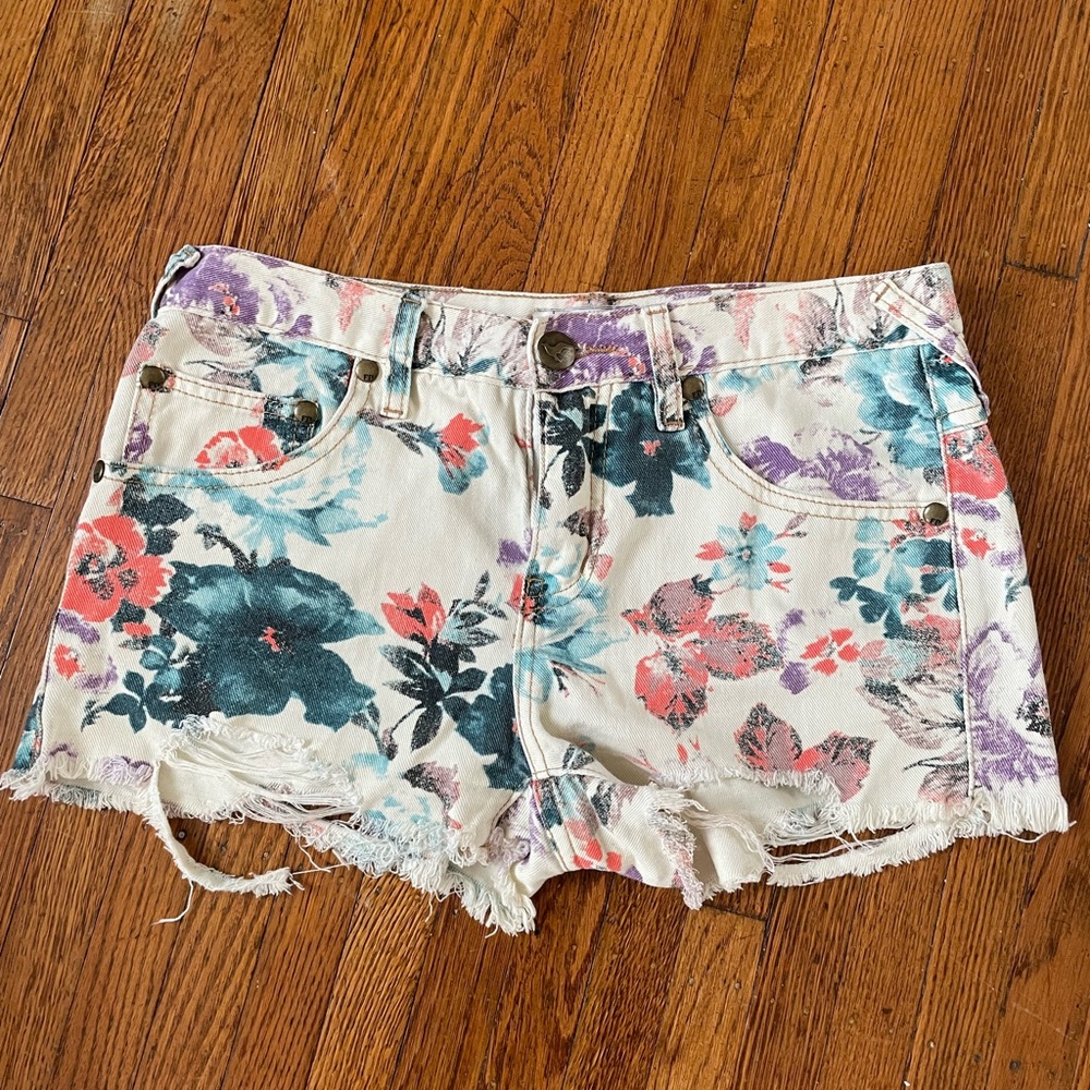 Free People floral distressed denim shorts